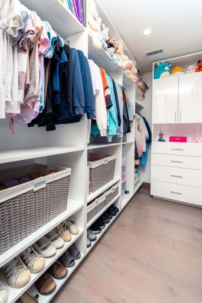 A White Color Closet Space With Coat Racks Copy