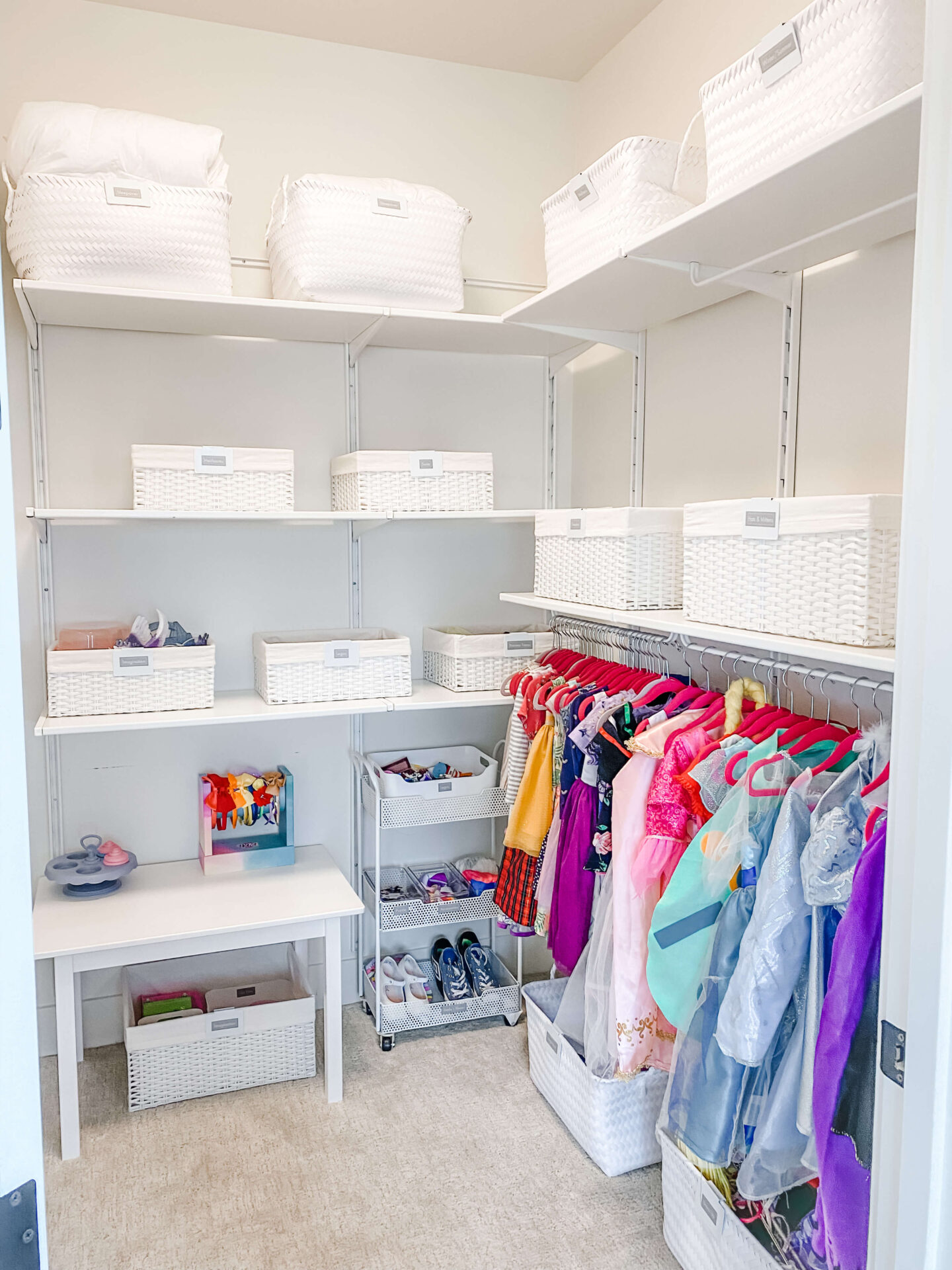 A Closet Space for Kids With White Organizers One