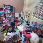 A Cluttered Floor Space With Toys