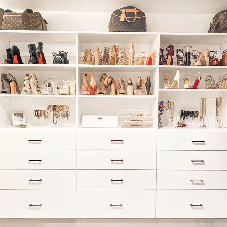 White closet shelves with handbags, shoes and labeled drawers