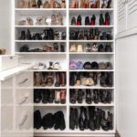 A Large White Shelf With Shoes and Heels