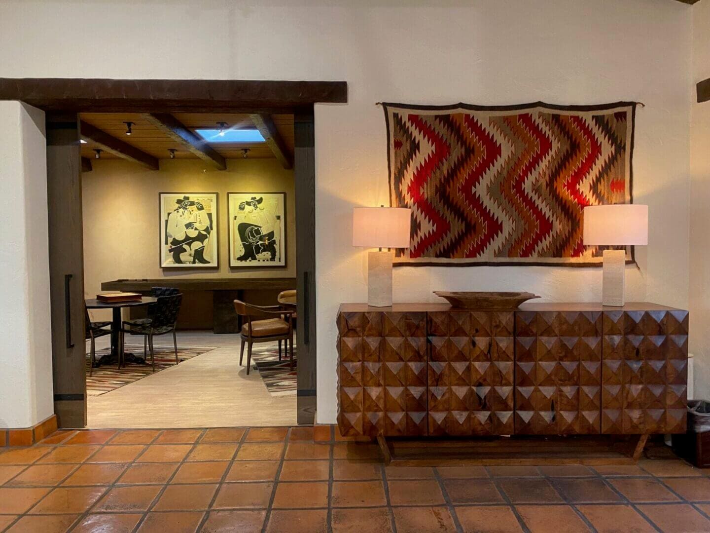 Cozy restaurant interior with warm lighting and rustic decor.
