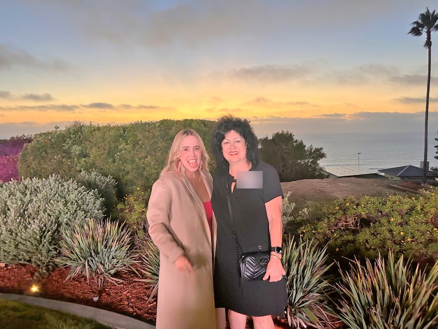 Ryen Toft and a fellow guest at sunset above the ocean at the Big Brothers Big Sisters of San Diego County gala in Point Loma