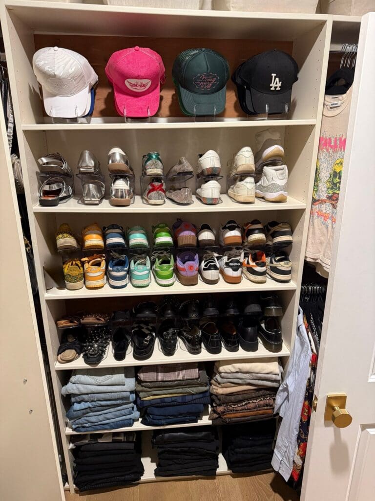 Baseball hats neatly displayed on shelves
