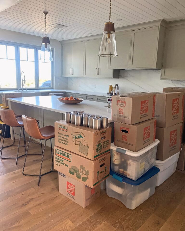 Kitchen stacked with moving boxes before unpacking, Del Mar home