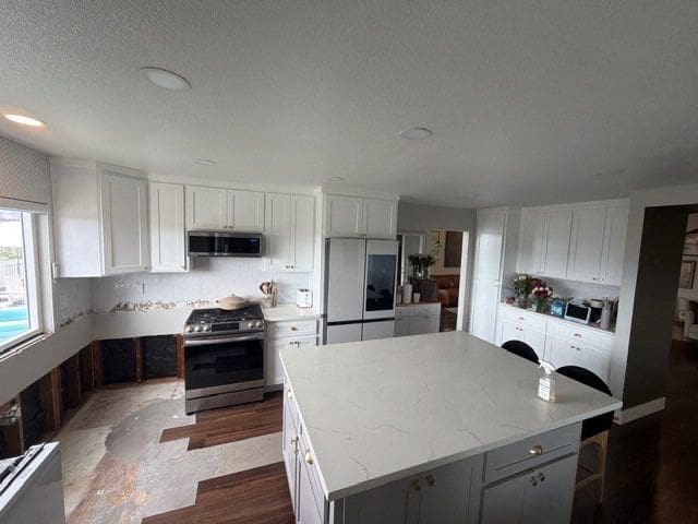 Mission Viejo kitchen with white cabinets before the flood remodel