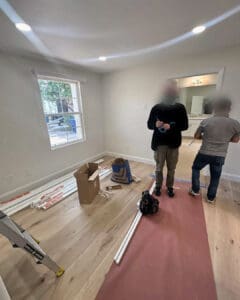 Floor runners rolled out in an empty room as the move in begins, San Diego home