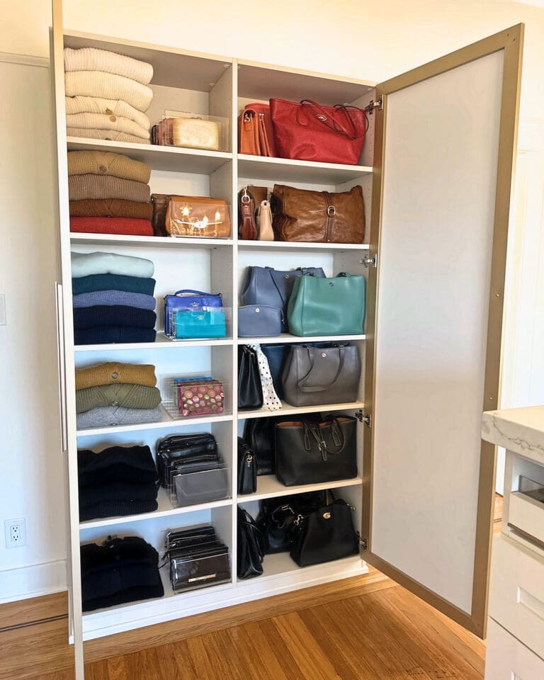 Organized closet shelves with folded sweaters and handbags lined up by color, San Diego