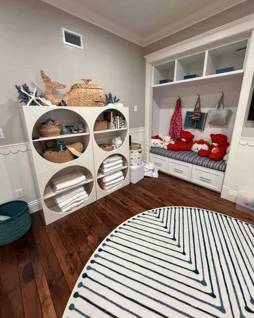 Playroom before organizing, with toys and stuffed animals scattered on shelves and the window seat, Los Angeles home