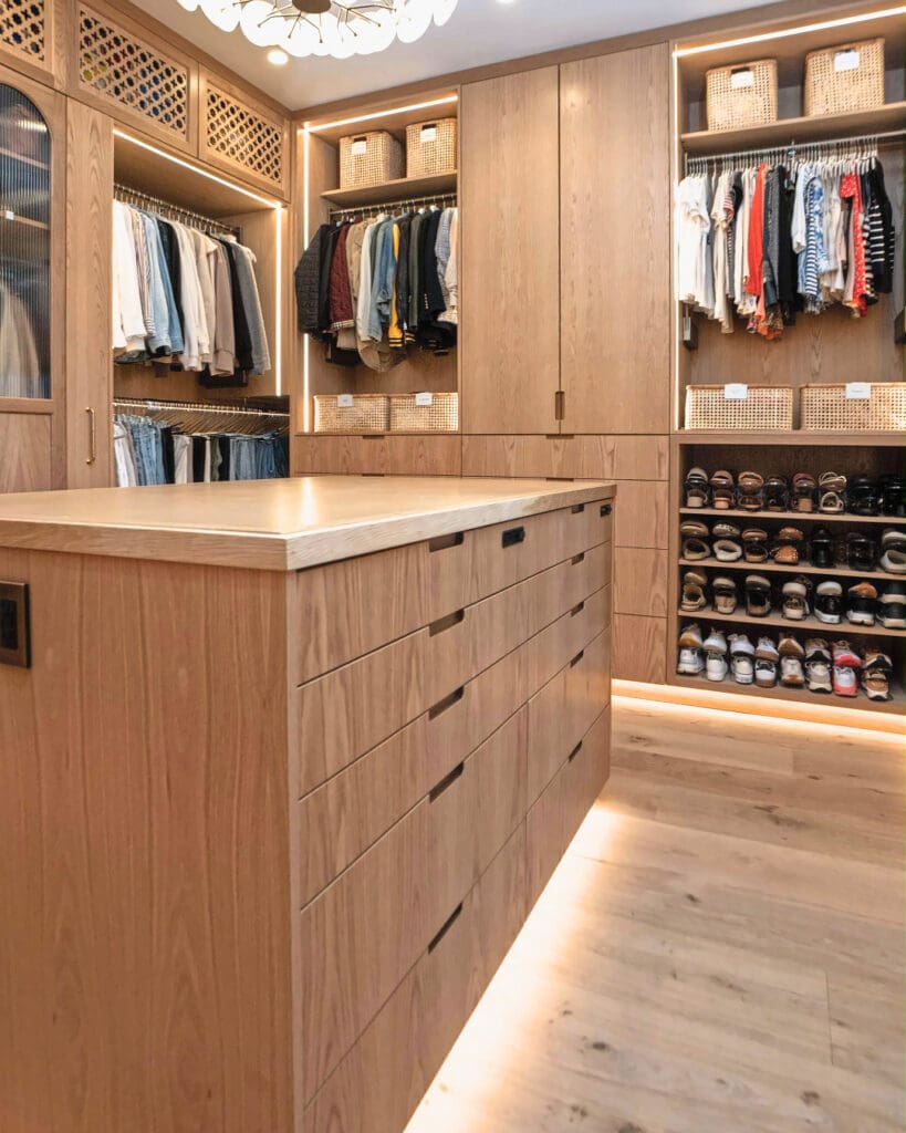 Organized walk-in closet with stylish storage solutions.